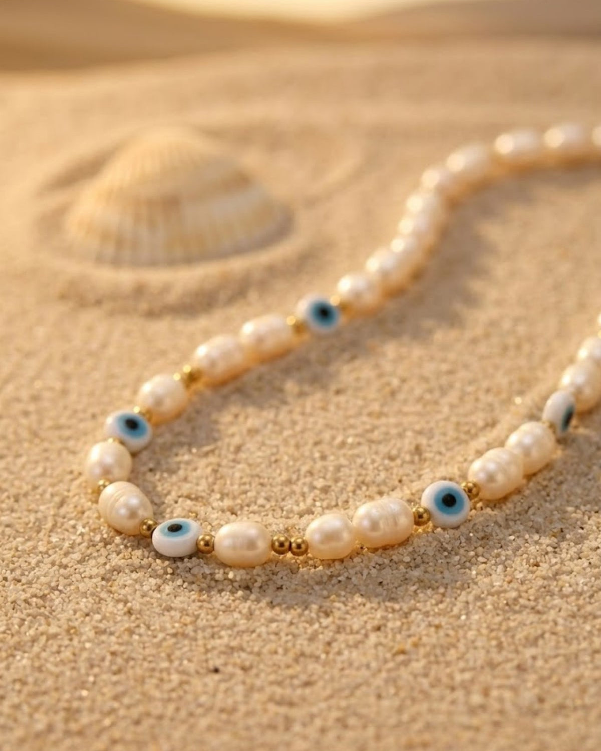 Collier “Naya” – Perle de culture  & Œil Protecteur